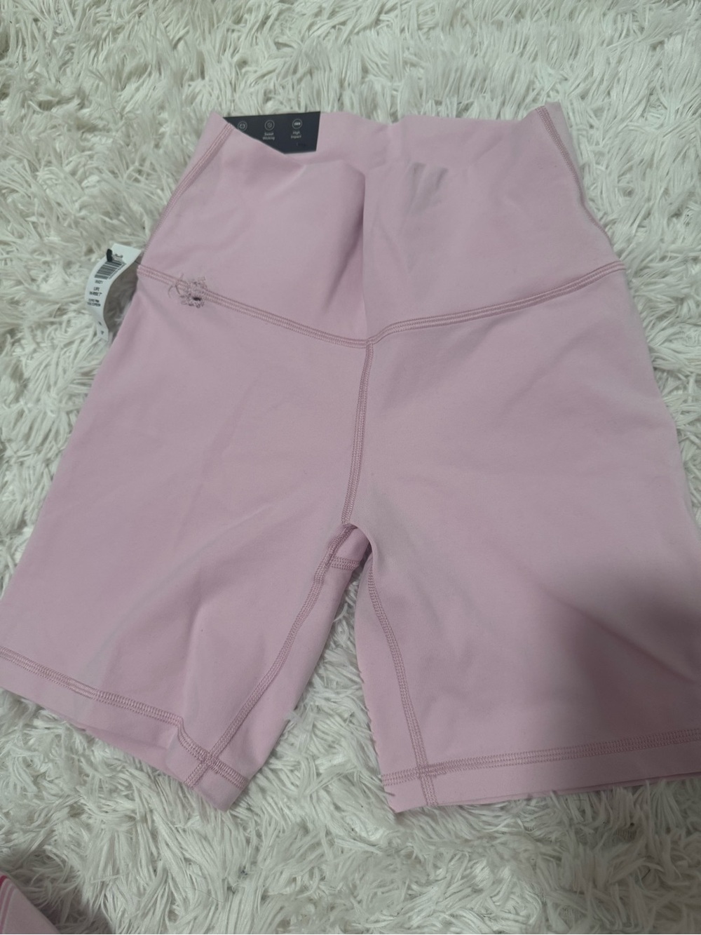 TNA pink bike shorts